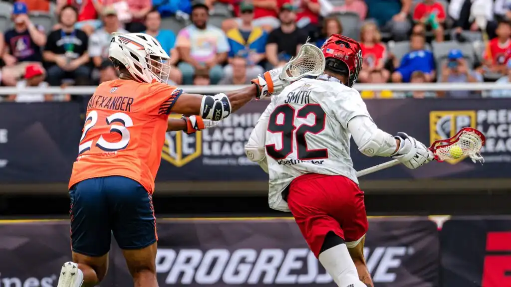 Archers Lacrosse Club short-stick defensive midfielder Dominique Alexander defends Dhane Smith in the 2022 Cash App Playoffs