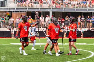 Chaos defense rejoices around their goalie (Photo courtesy of Nick Ieradi).