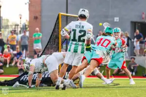 Rookie Garrett Leadmon puts the finishing touches right at the crease (Photo courtesy of Nick Ieradi).