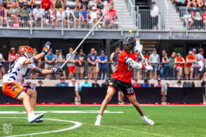 Josh Byrne makes a behind the back pass (Photo courtesy of Nick Ieradi).
