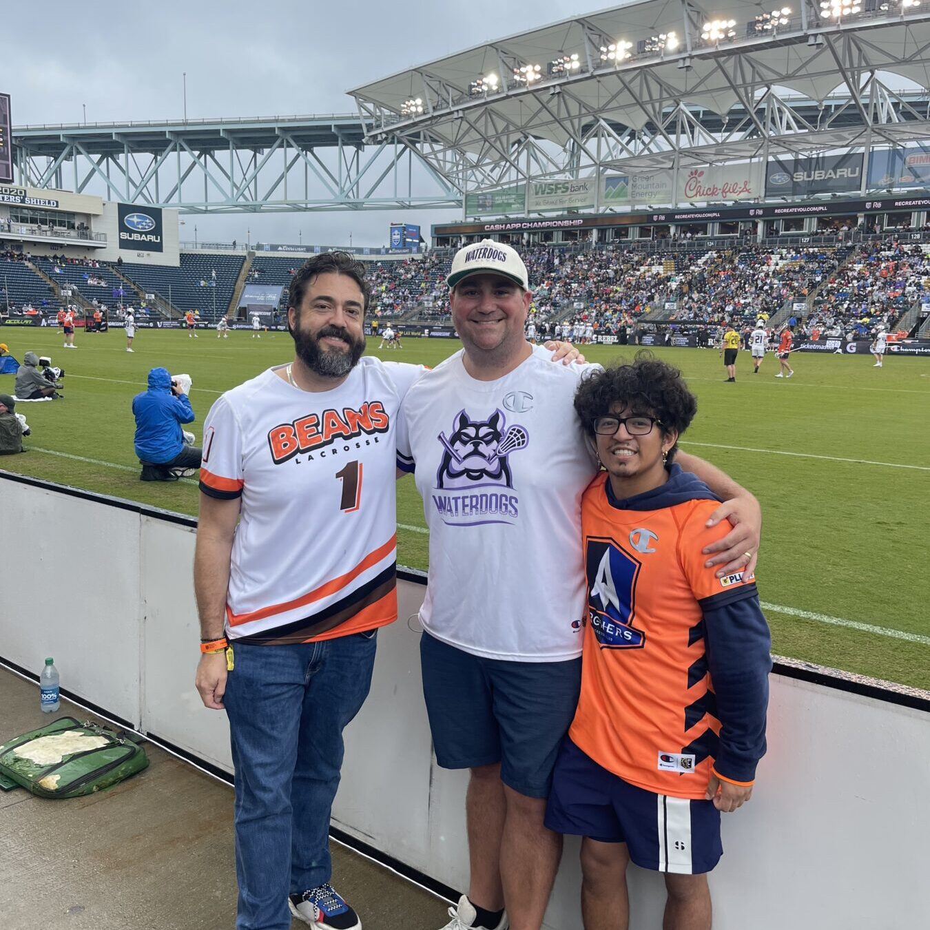 Braeden (right) with two fellow members of PLL Discord community at the 2023 Championship Game.